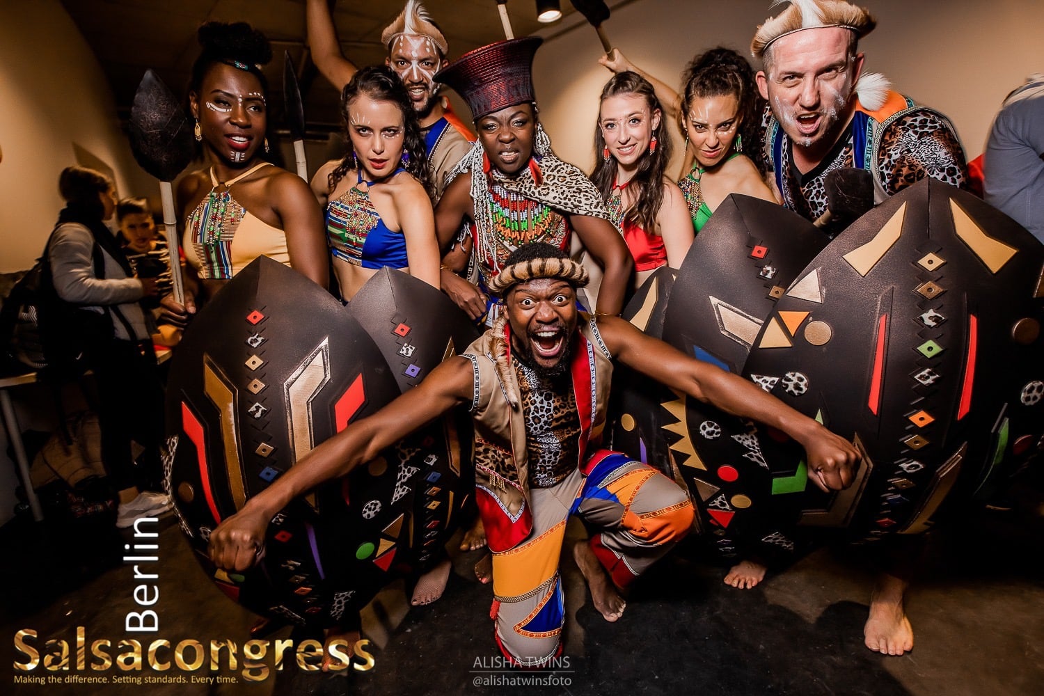 an image of Elvis Sibeko and his crew All wearing african attires and doing a power pose in front of the camera
