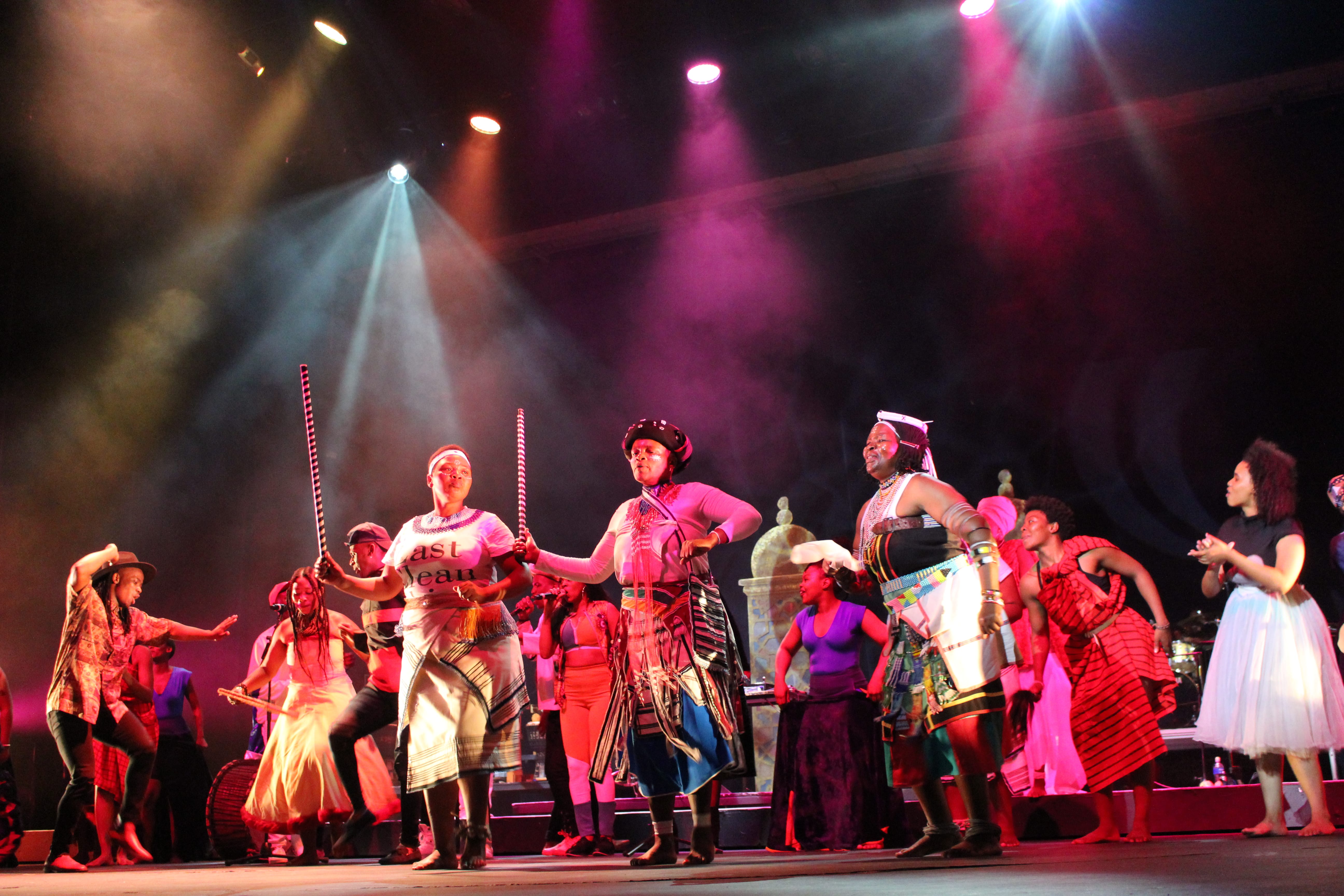 an image of several african elderly women on the stage performing at an african event in berlin