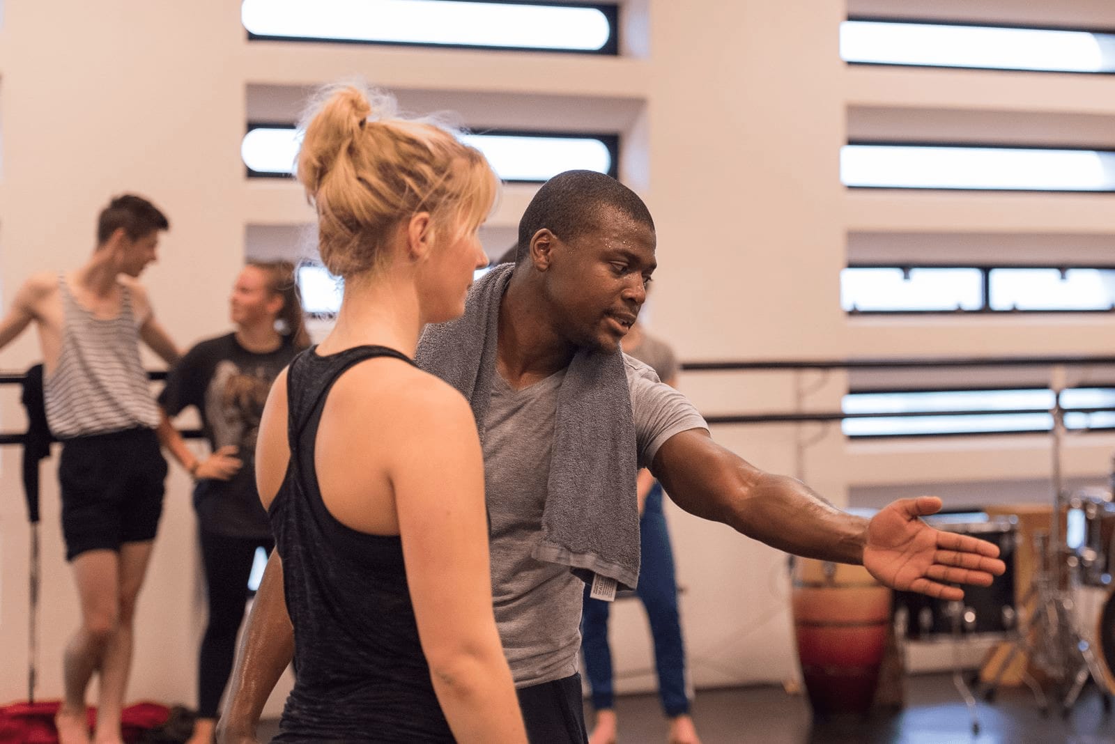 an image of Elvis Sibeko teaching a woman how to dance