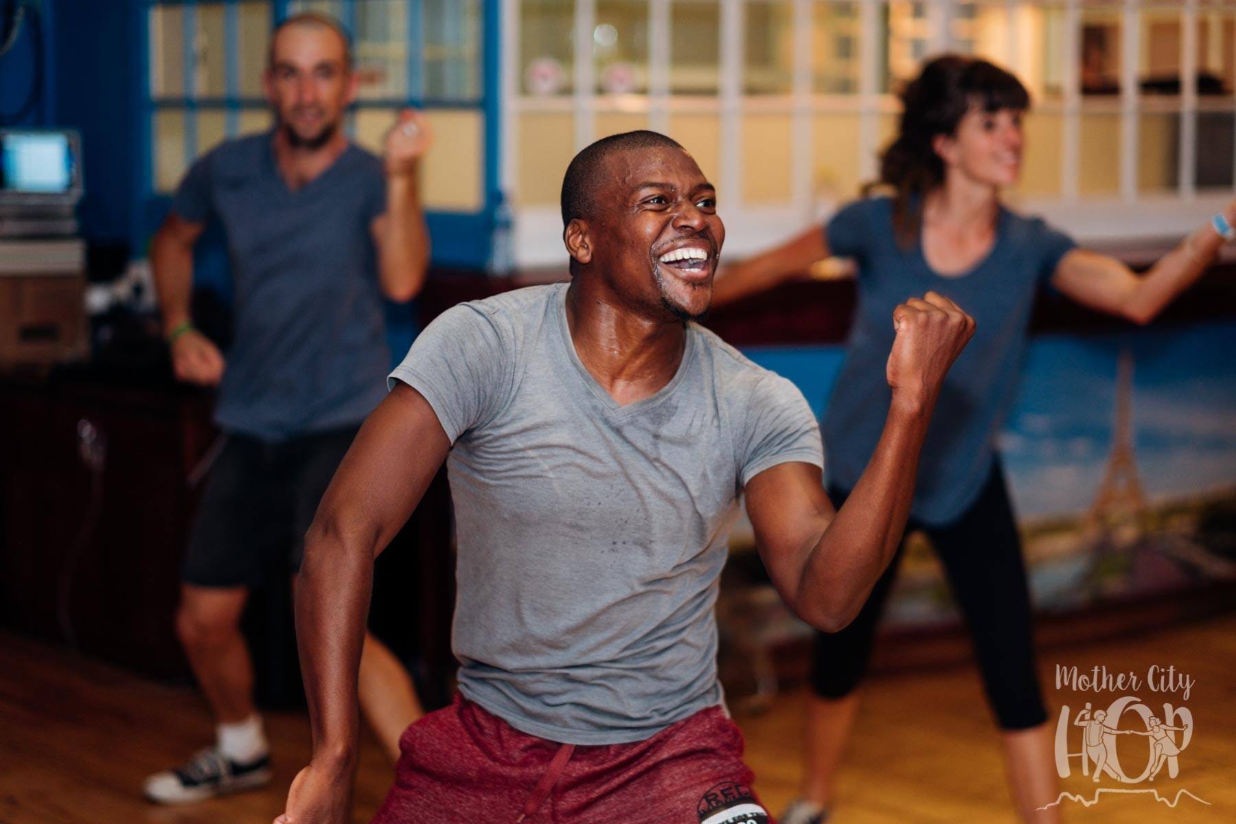 an image of three people in the middle of the zavom dance fitness workout 